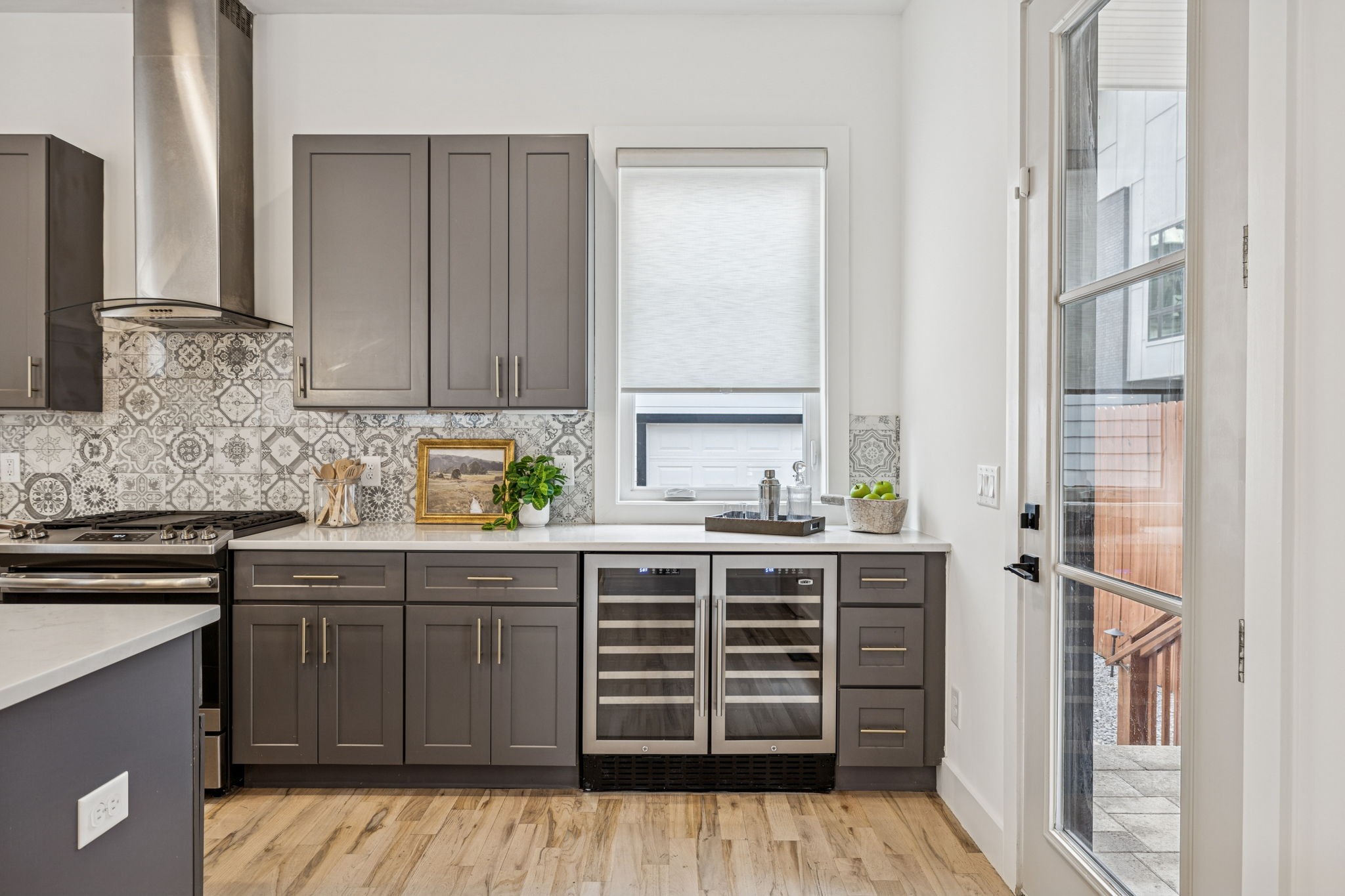 1403 10th Avenue North, Unit A Nashville, TN 37208 - Photo 12 of 53 a kitchen with stainless steel appliances a stove and a refrigerator