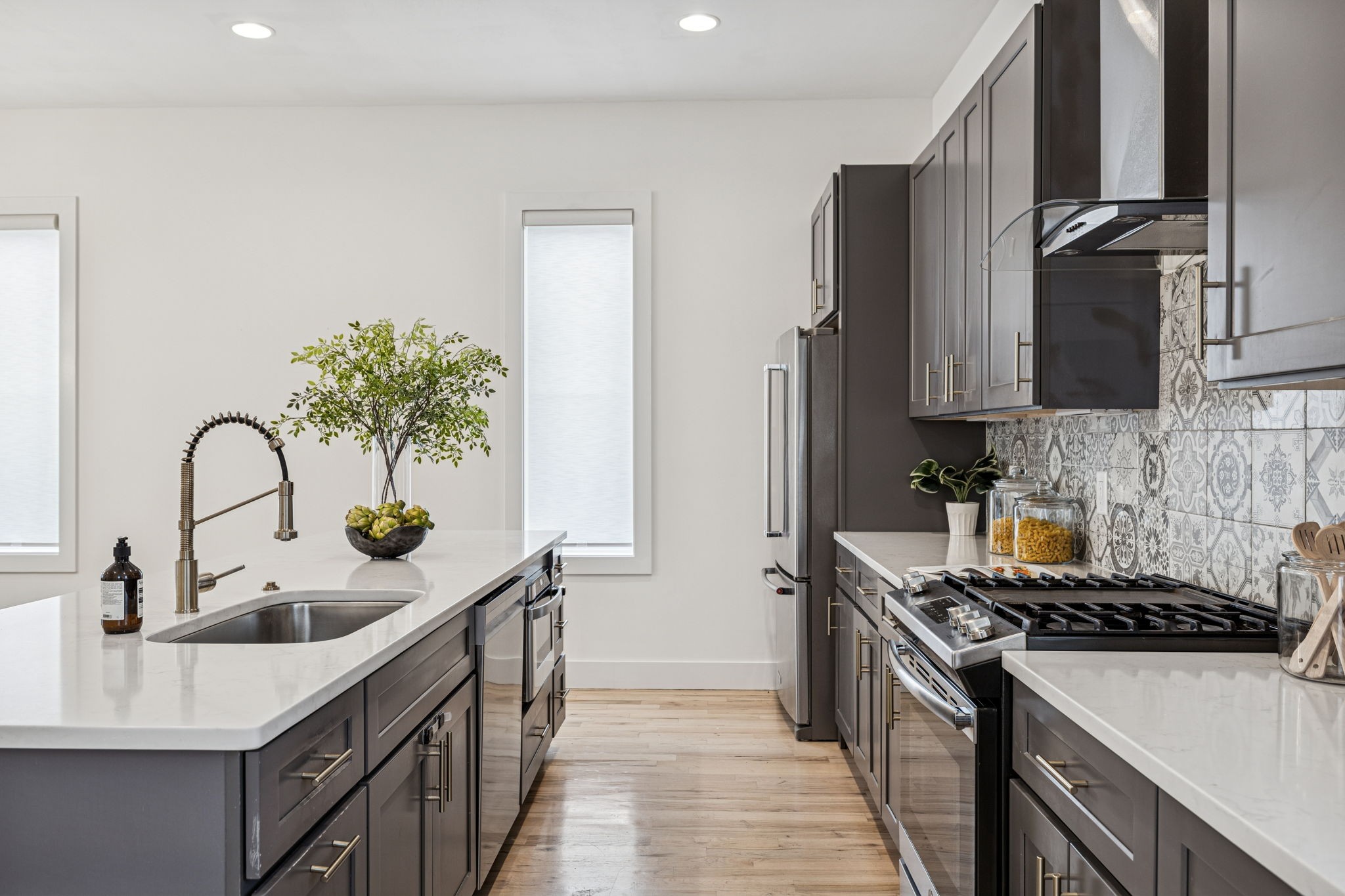 1403 10th Avenue North, Unit A Nashville, TN 37208 - Photo 13 of 53 a kitchen with stainless steel appliances a sink stove and cabinets