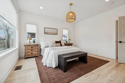 a bathroom with a sink a mirror and a shower