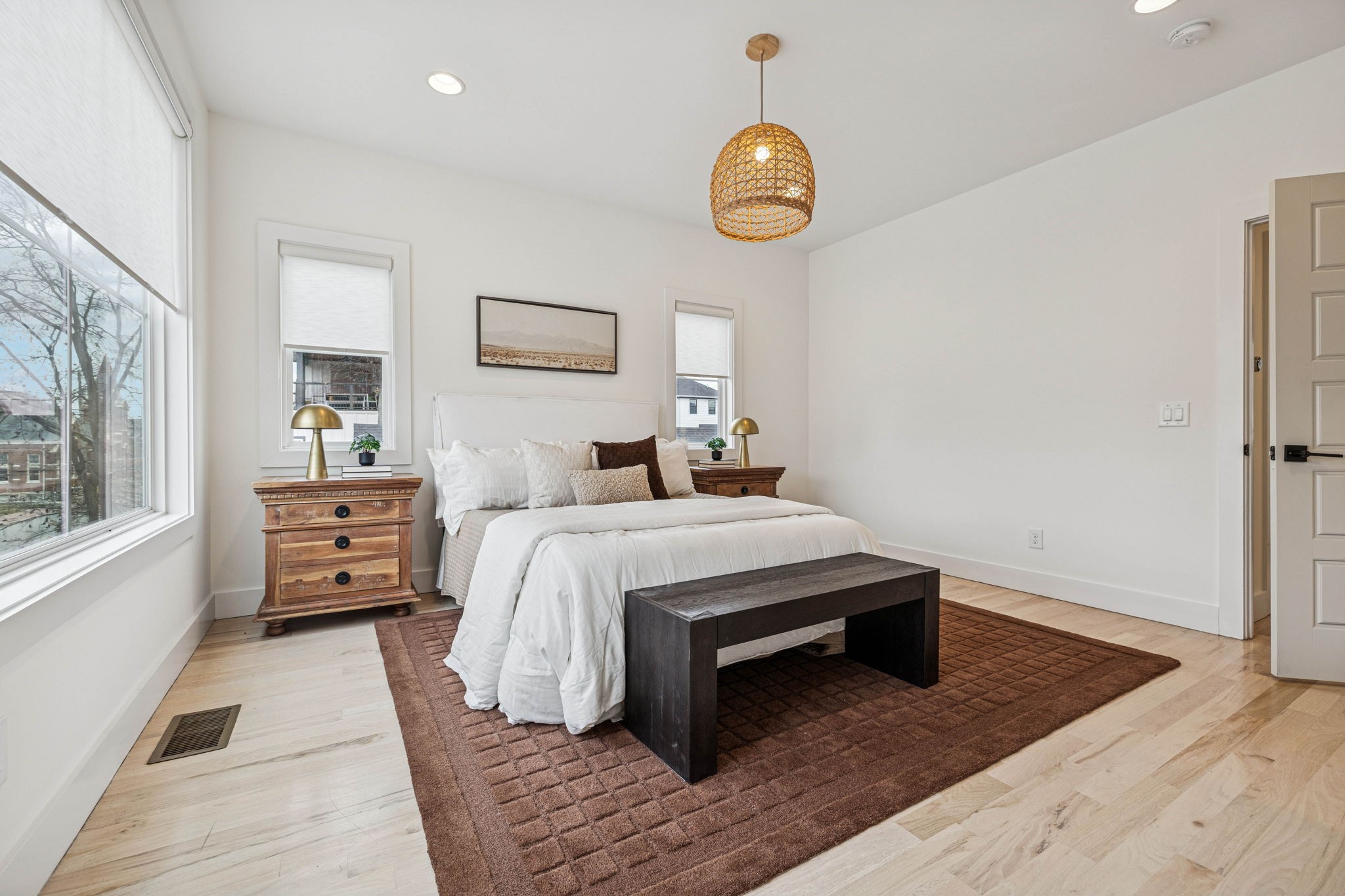1403 10th Avenue North, Unit A Nashville, TN 37208 - Photo 17 of 53 a bedroom with furniture and wooden floor