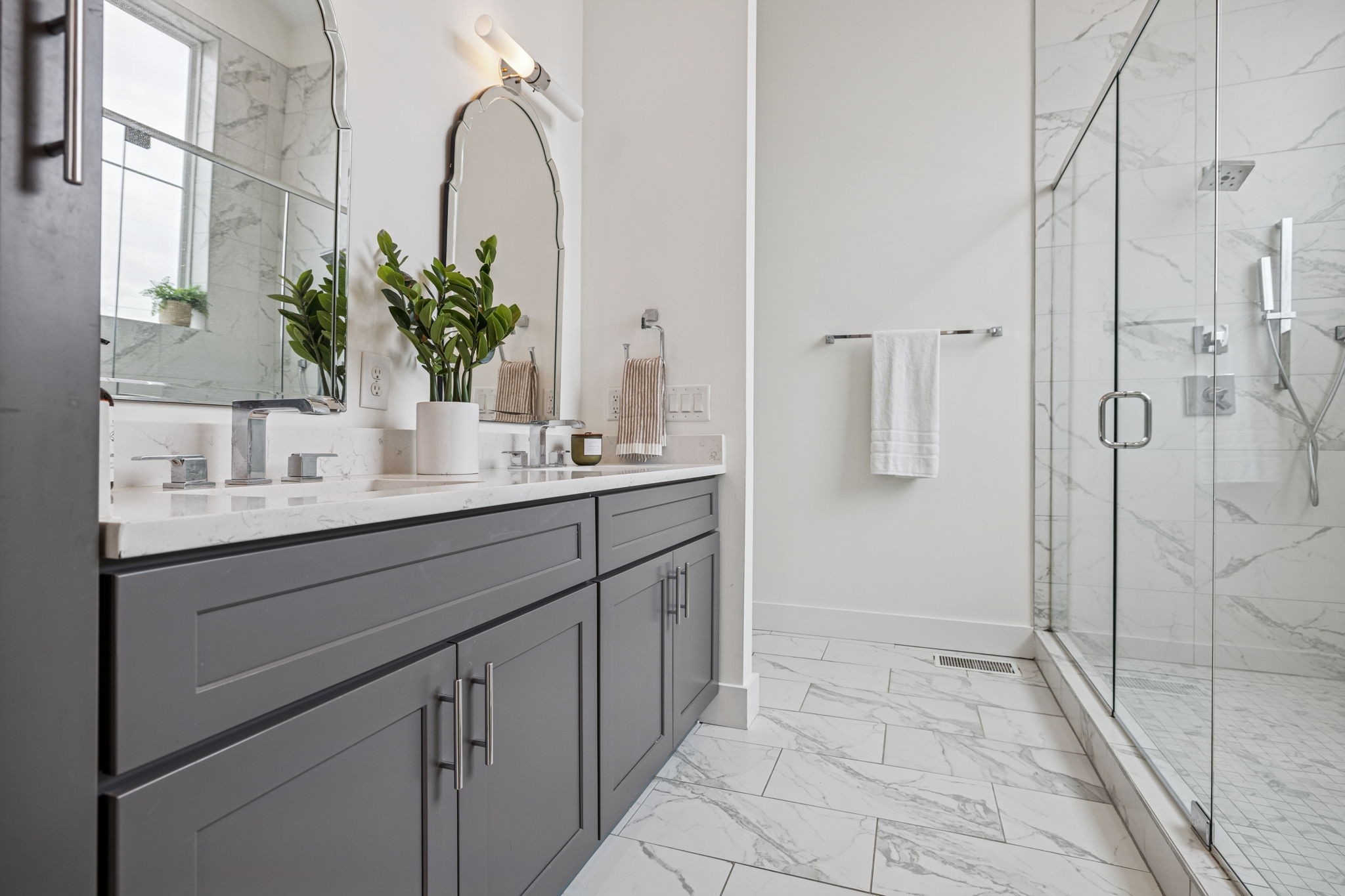 1403 10th Avenue North, Unit A Nashville, TN 37208 - Photo 19 of 53 a bathroom with a sink a mirror and a shower