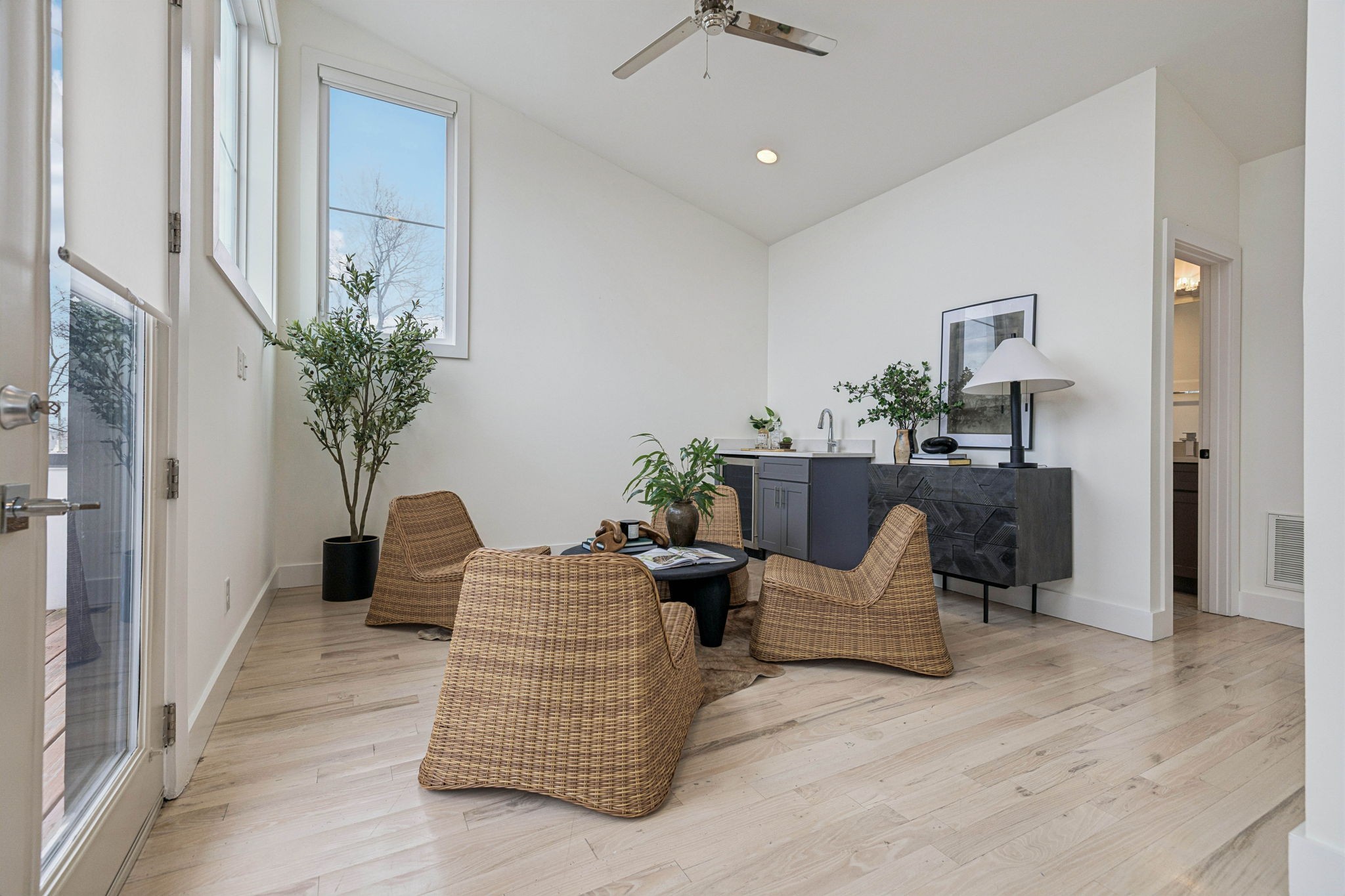 1403 10th Avenue North, Unit A Nashville, TN 37208 - Photo 22 of 53 a living room with furniture and a potted plant