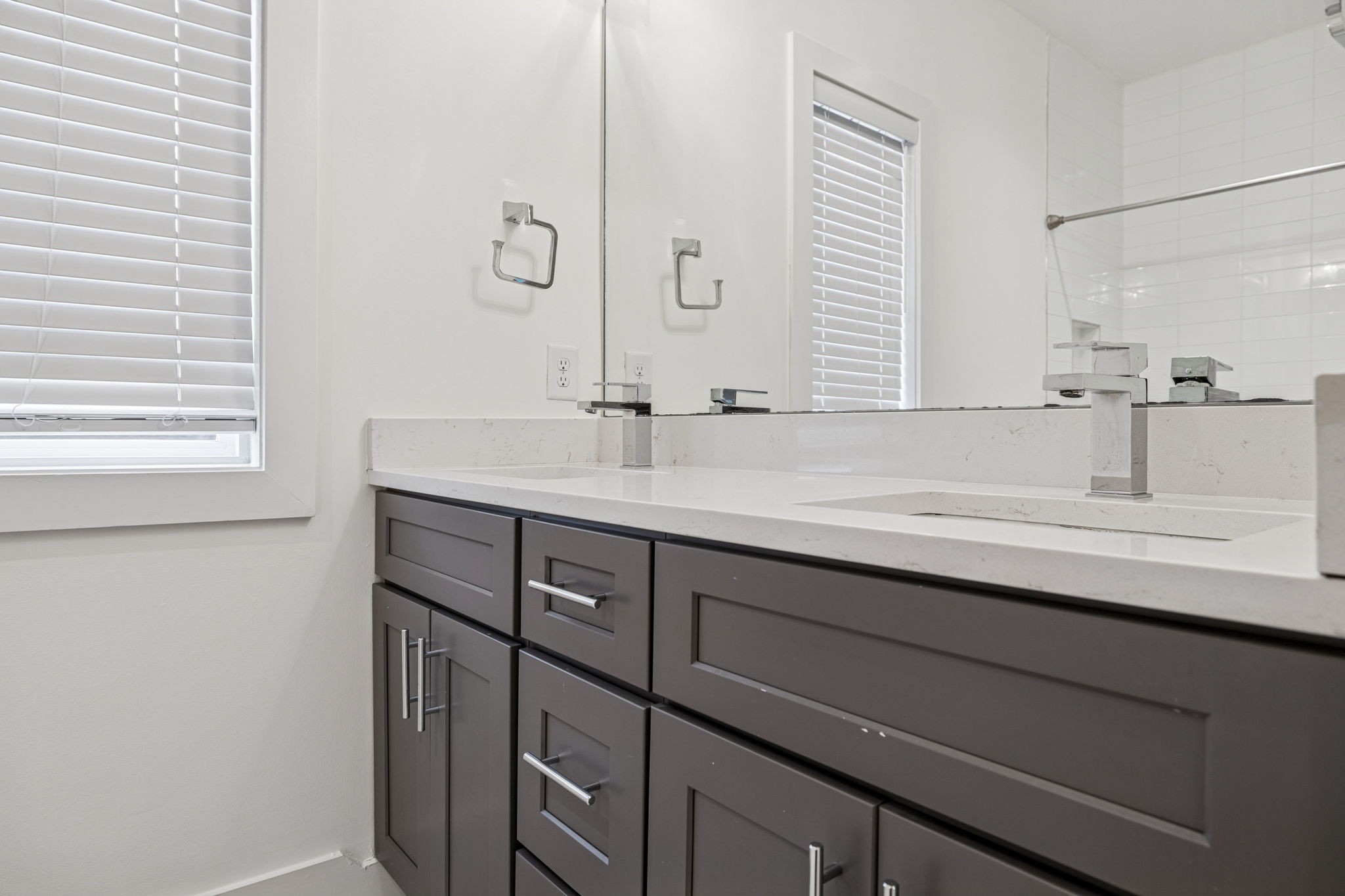 1403 10th Avenue North, Unit A Nashville, TN 37208 - Photo 36 of 53 a bathroom with a sink and a mirror