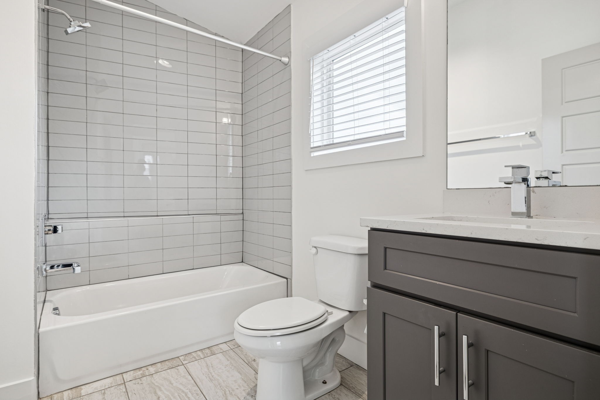 1403 10th Avenue North, Unit A Nashville, TN 37208 - Photo 37 of 53 a bathroom with a sink a toilet and bathtub
