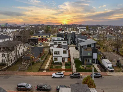 an aerial view of a house with a garden