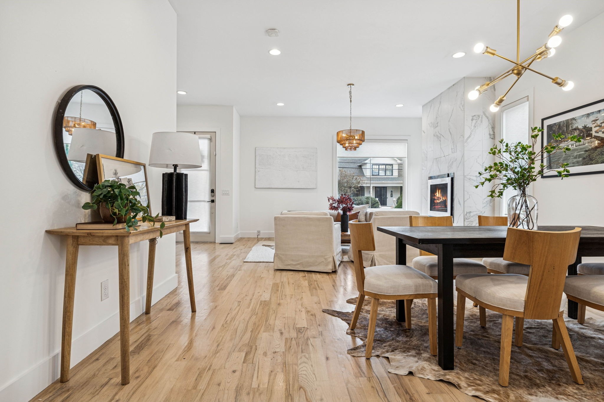 1403 10th Avenue North, Unit A Nashville, TN 37208 - Photo 9 of 53 a view of a dining room with furniture and a potted plant