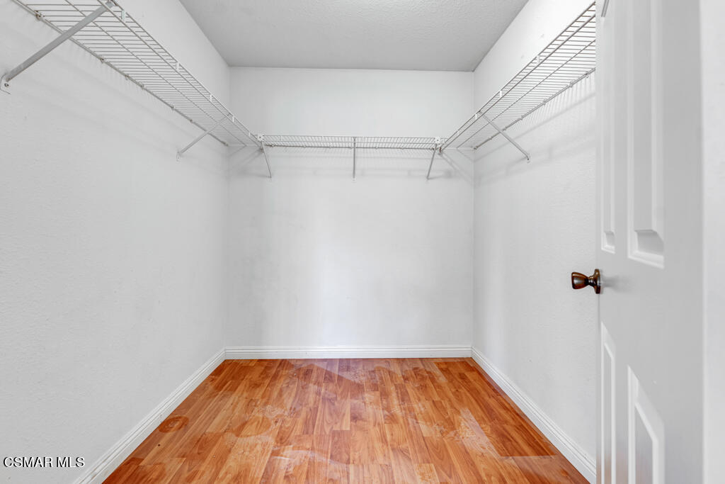 2676 Santa Ynez Avenue Simi Valley, CA 93063 - Photo 17 of 46 a view of a room with wooden floor