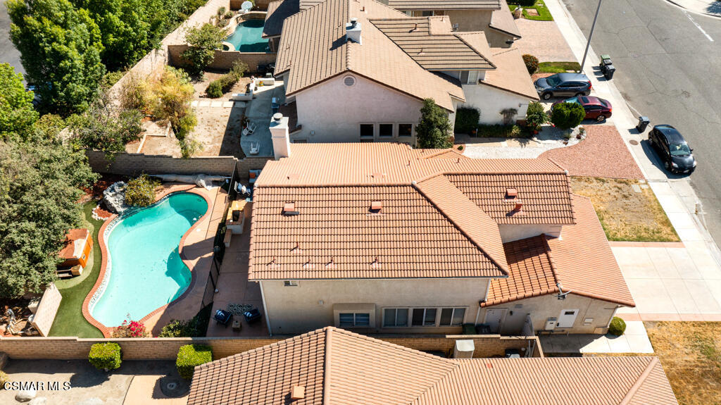 2676 Santa Ynez Avenue Simi Valley, CA 93063 - Photo 43 of 46 a view of a patio with couches near an umbrella