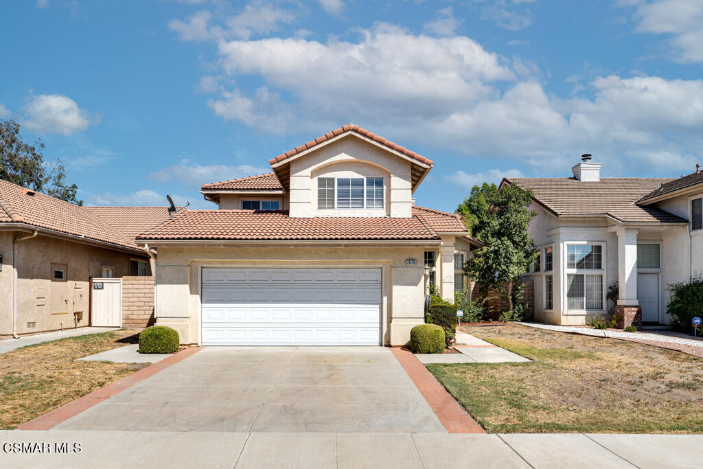 2676 Santa Ynez Avenue Simi Valley, CA 93063 - Photo 46 of 46 a front view of a house with a yard and garage