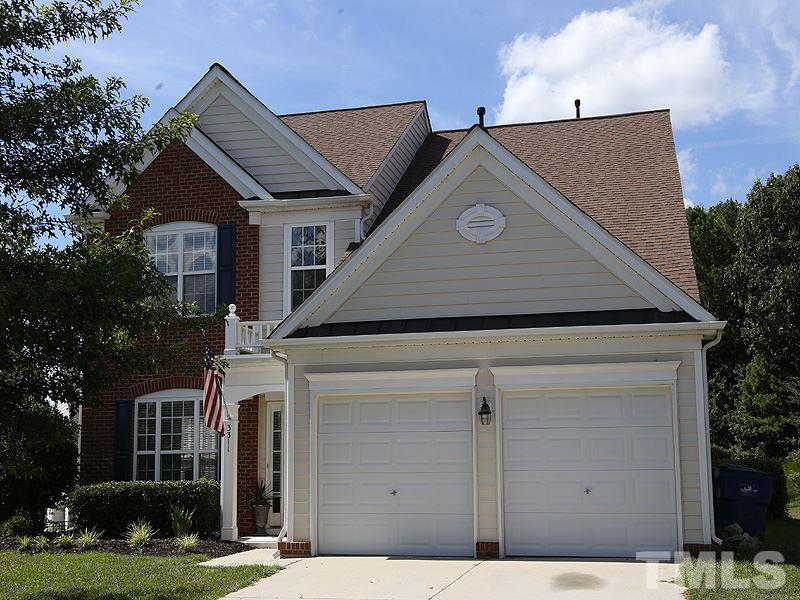 3311 Colorcott Street Raleigh, NC 27614 - Photo 2 of 3 a front view of a house with a yard