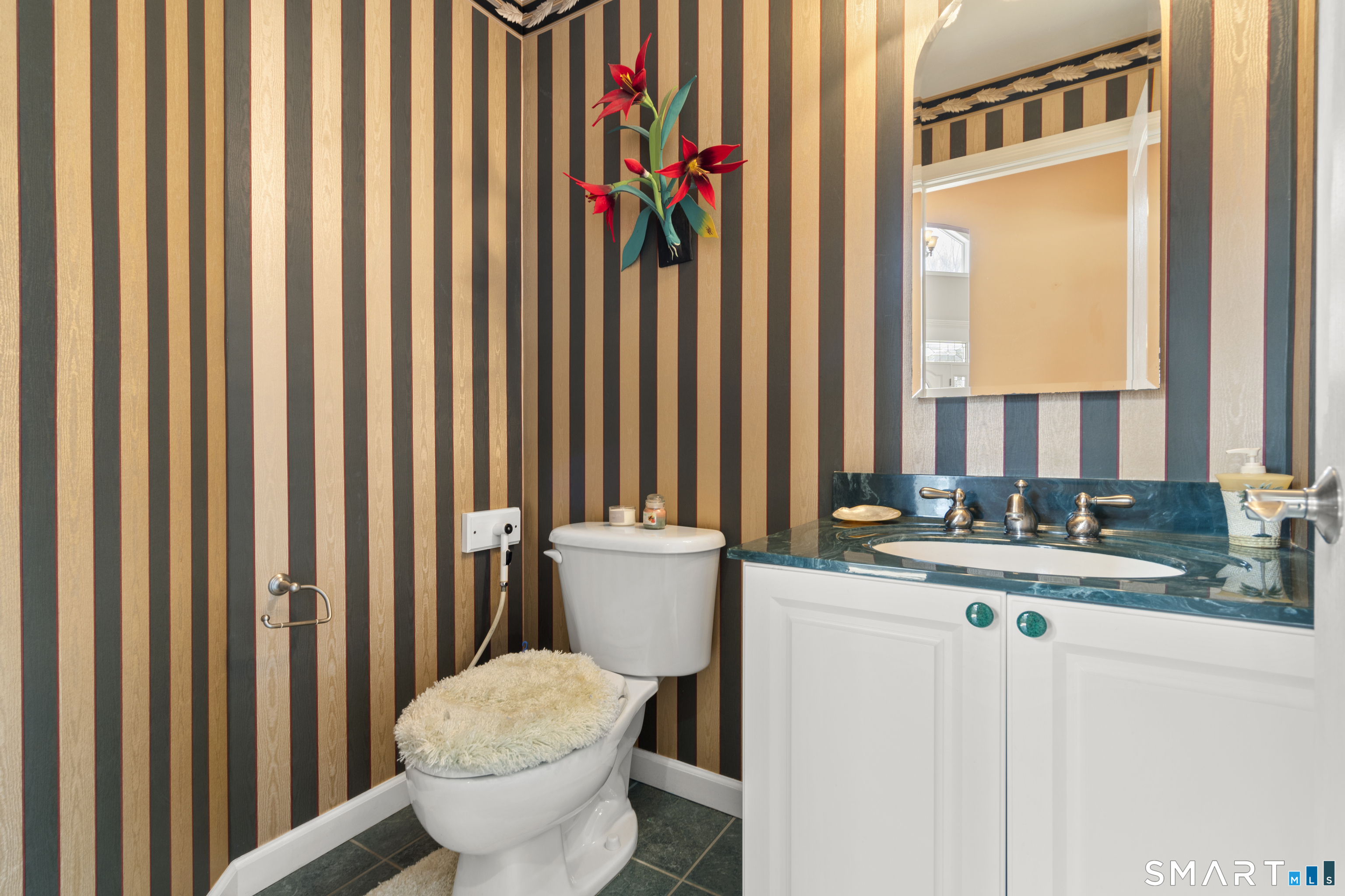 1729 Litchfield Road Watertown, CT 06795 - Photo 11 of 39 a bathroom with a granite countertop sink and a toilet