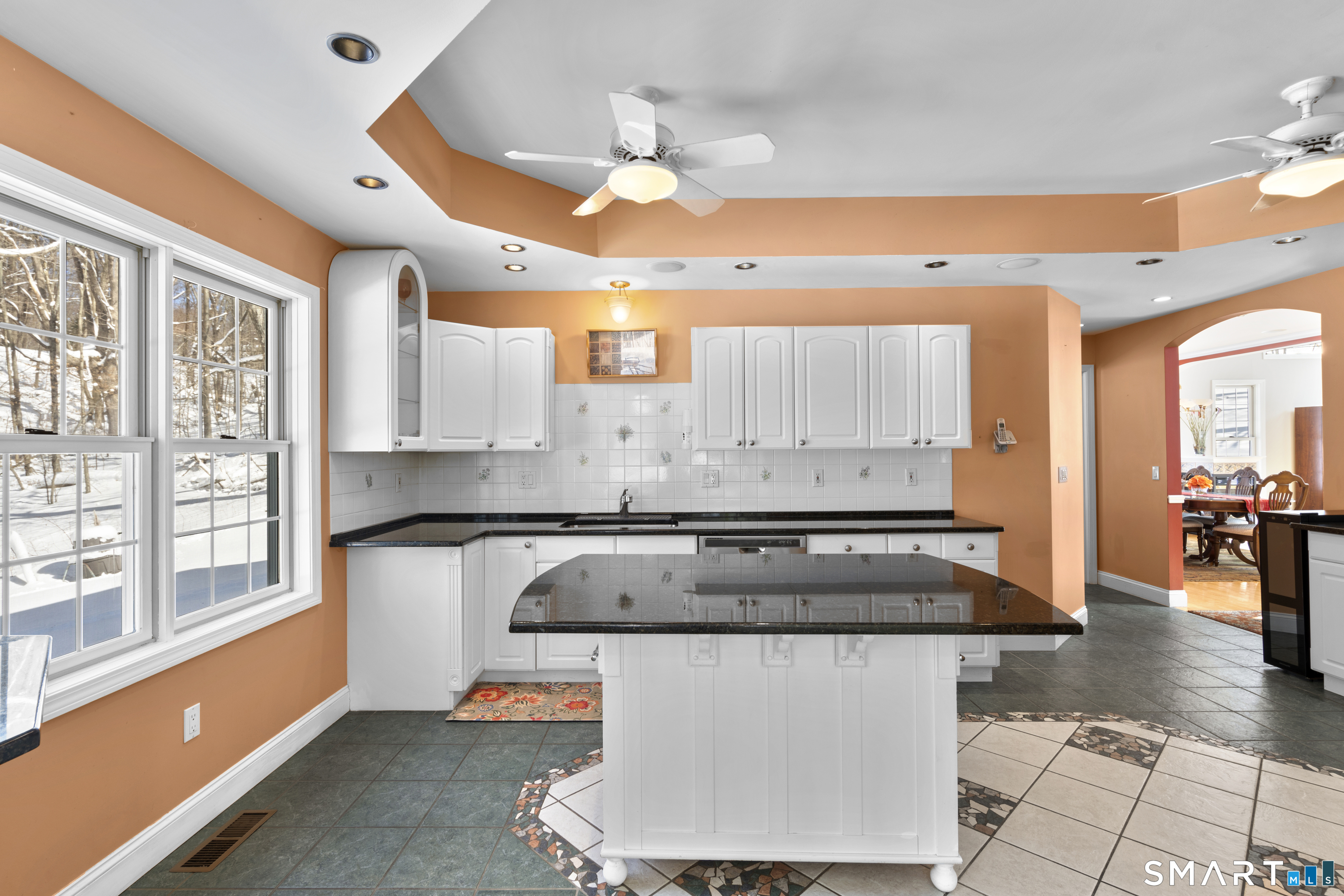 1729 Litchfield Road Watertown, CT 06795 - Photo 13 of 39 a kitchen with sink a stove and cabinets