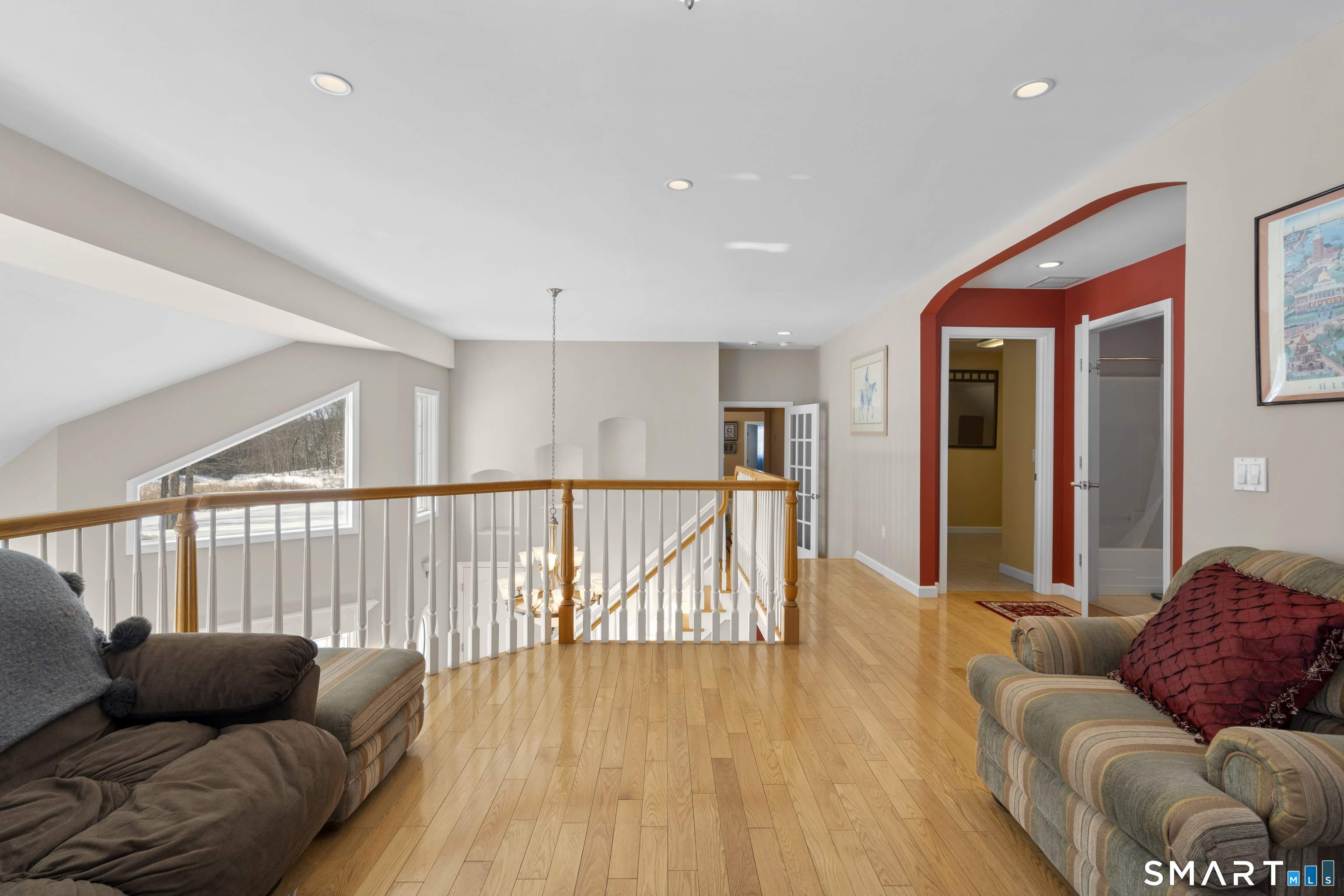 1729 Litchfield Road Watertown, CT 06795 - Photo 22 of 39 a living room with furniture and a wooden floor