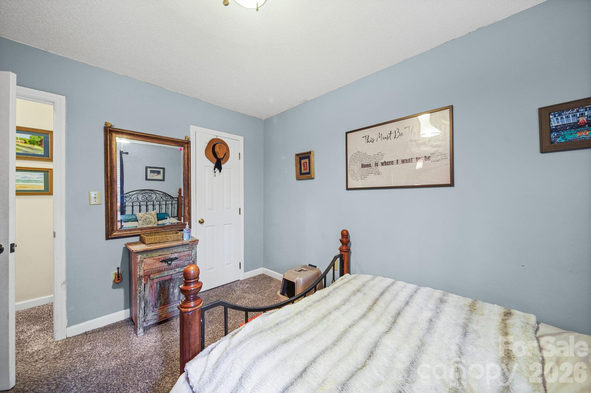 2788 Red Bud Lane Fort Mill, SC 29715 - Photo 22 of 35 a bedroom that has a bed and a desk in it