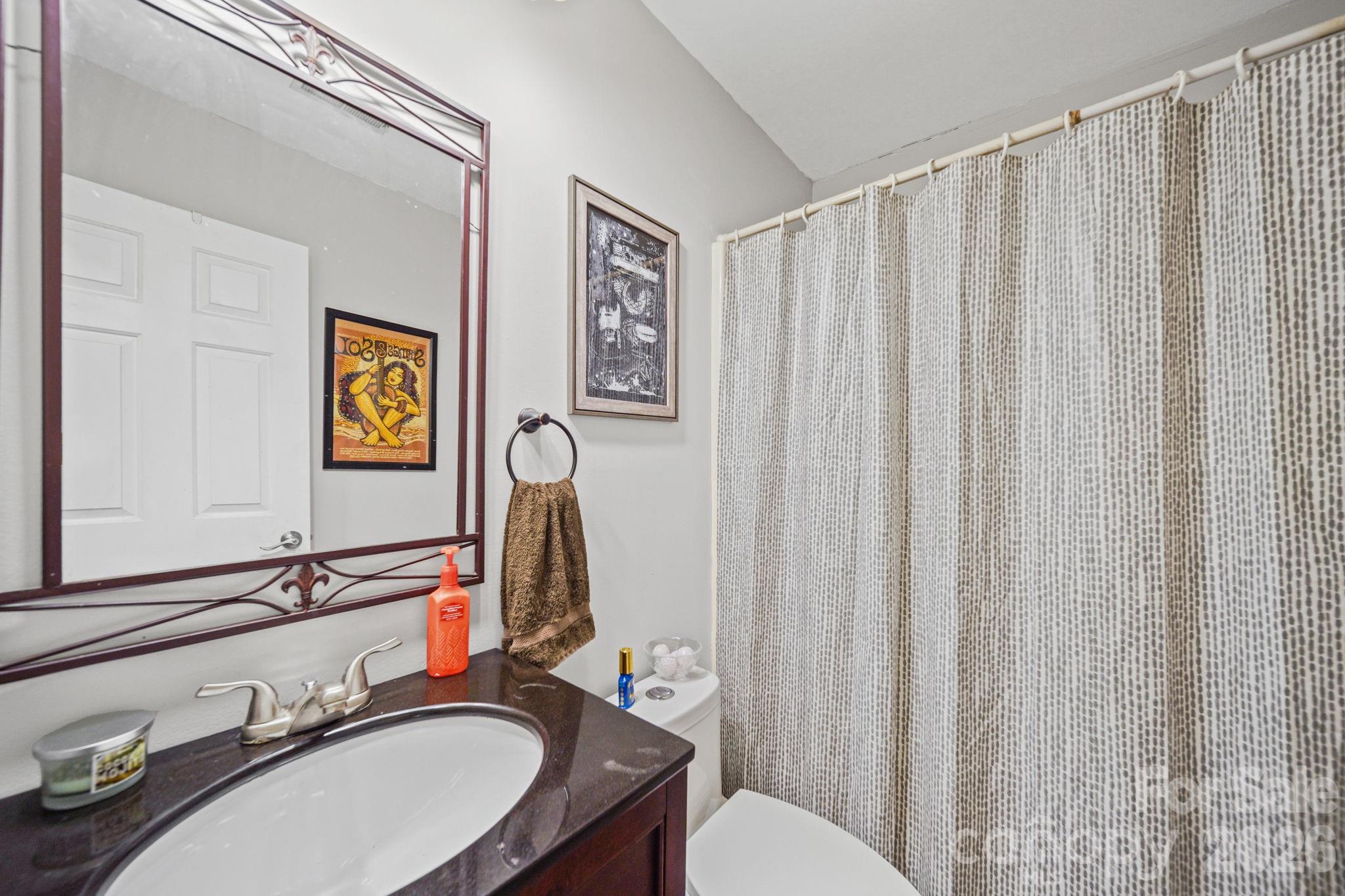2788 Red Bud Lane Fort Mill, SC 29715 - Photo 23 of 35 a bathroom with a sink vanity mirror and toilet