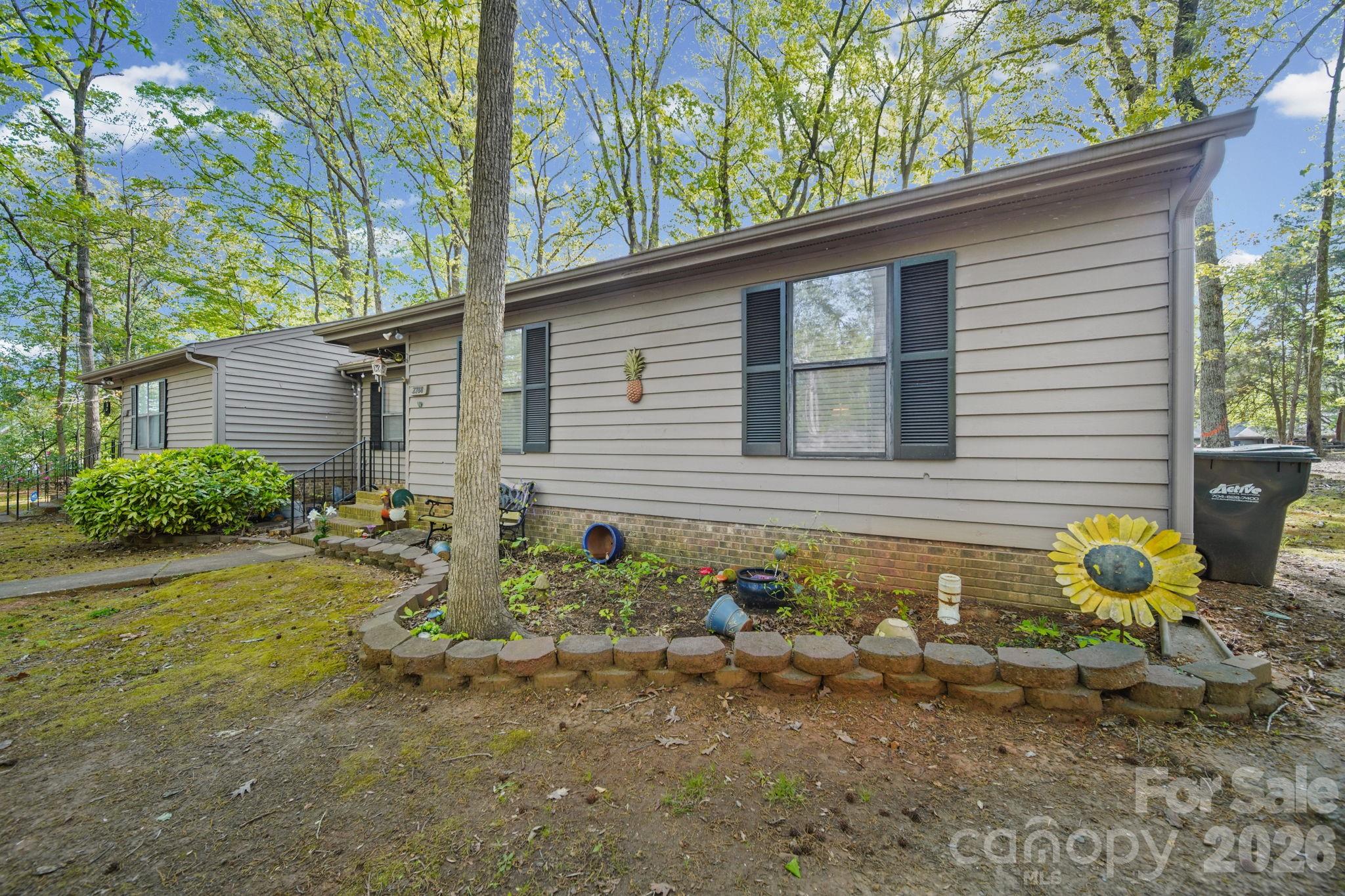 2788 Red Bud Lane Fort Mill, SC 29715 - Photo 33 of 35 a view of a back yard of the house