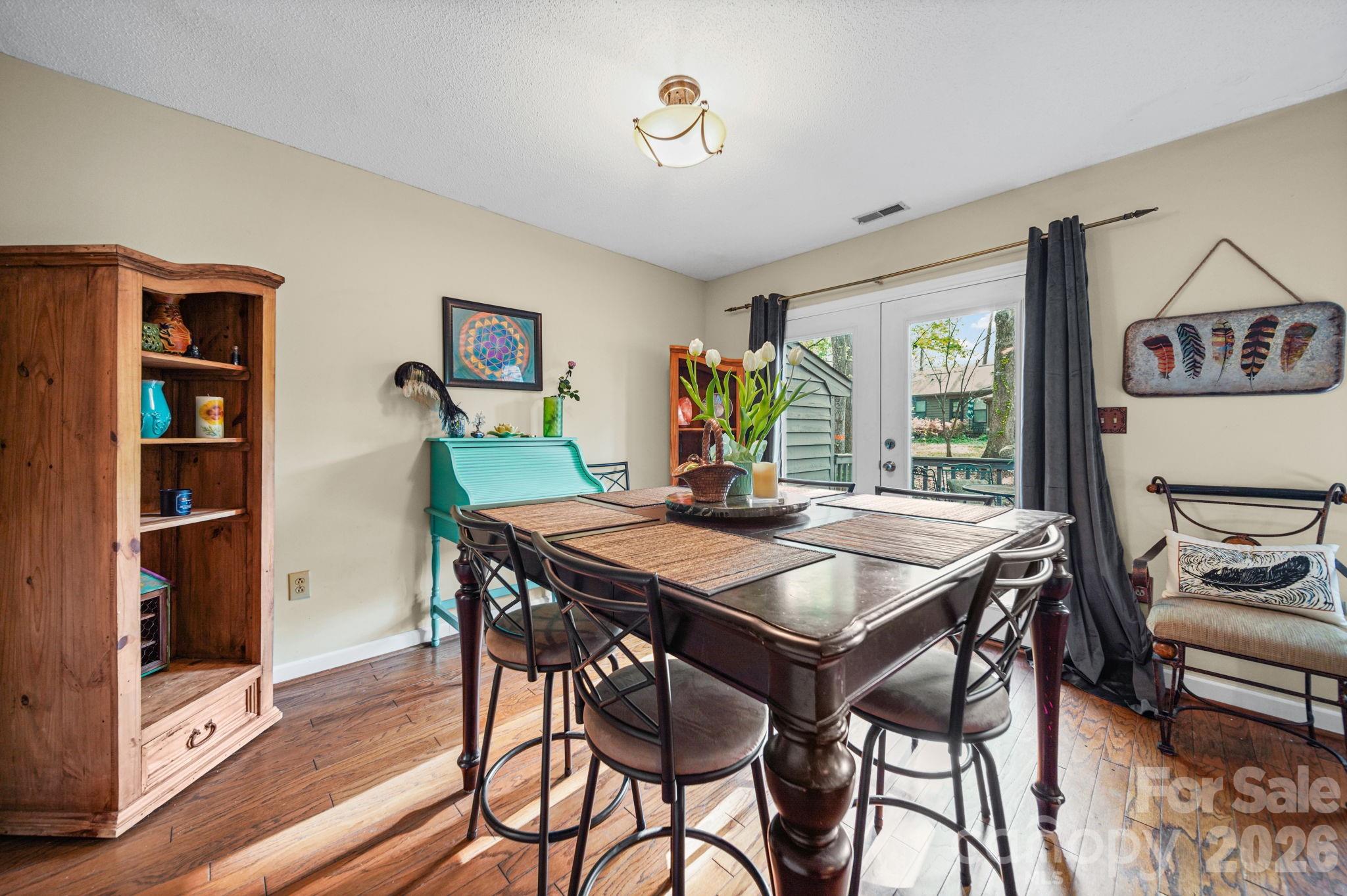 2788 Red Bud Lane Fort Mill, SC 29715 - Photo 8 of 35 a view of a dining room with furniture window and wooden floor