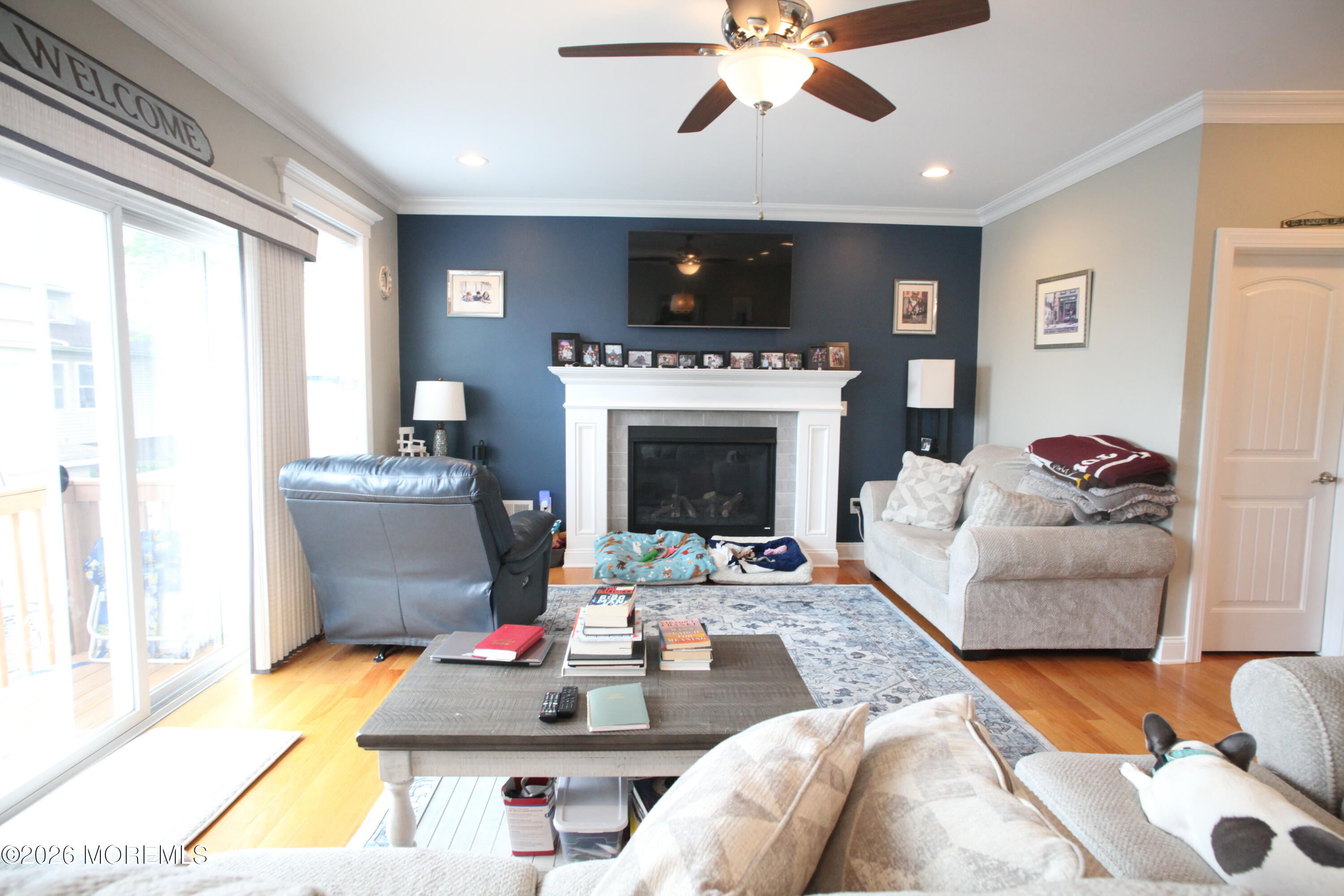 107 Waldron Road Toms River, NJ 08753 - Photo 4 of 20 a living room with furniture and a fireplace
