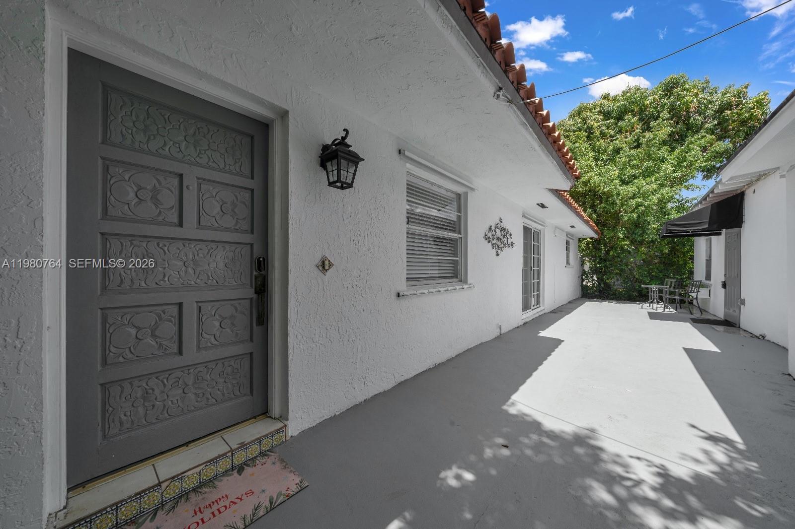 1044 Southwest 13th Court, Unit 2 Miami, FL 33135 - Photo 2 of 17 a view of a house with a small space