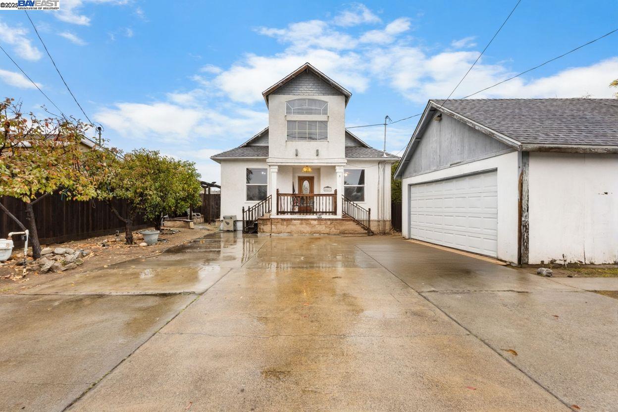 2421 West Rumble Road Modesto, CA 95350 - Photo 1 of 25 a view of a house with a yard