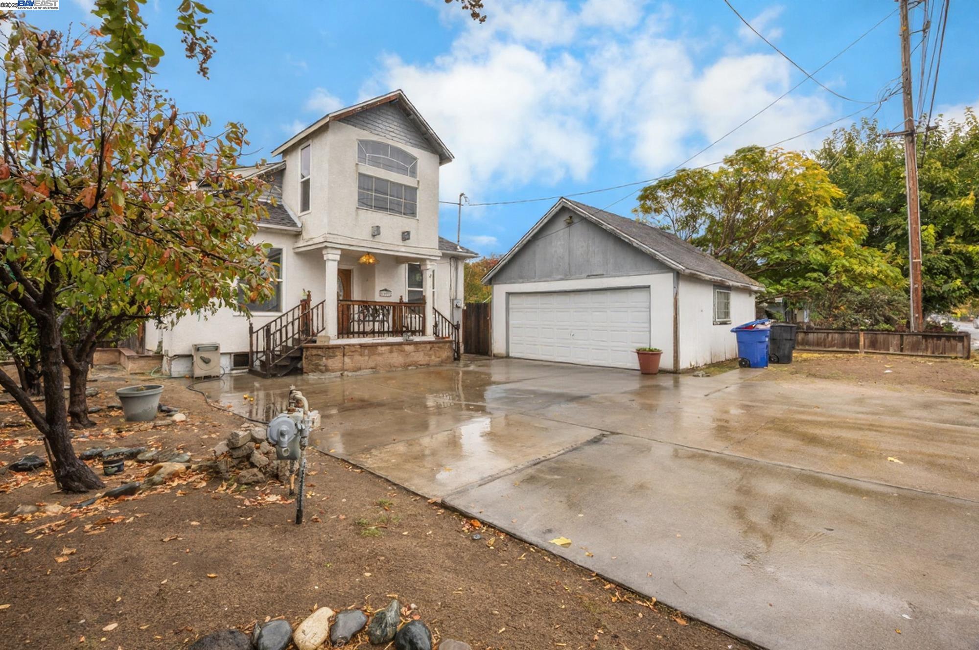 2421 West Rumble Road Modesto, CA 95350 - Photo 2 of 25 a front view of a house with a yard
