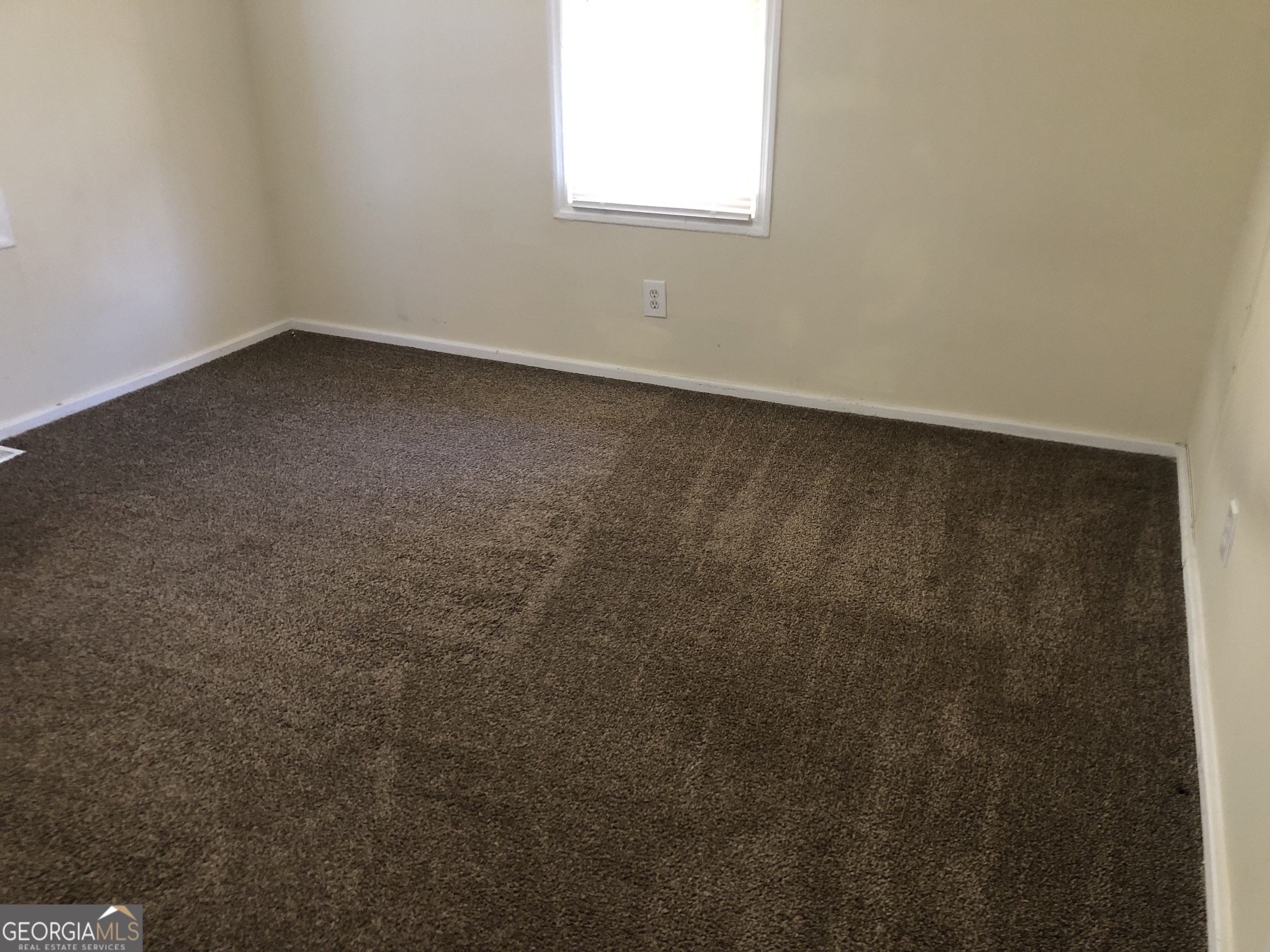 4454 Highway 3 Griffin, GA 30223 - Photo 15 of 23 an empty room with a window