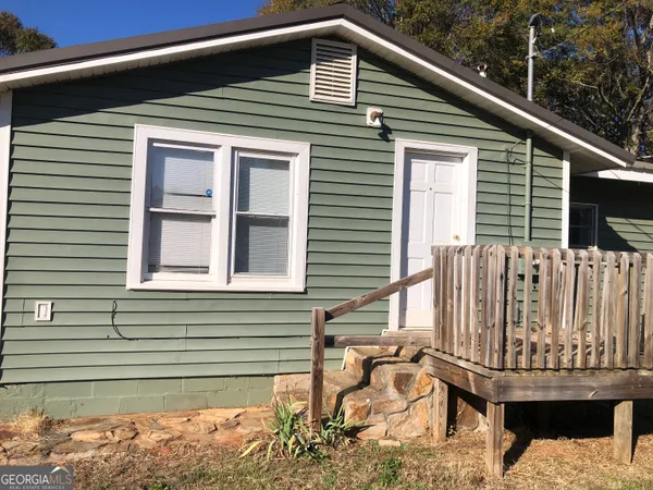 a front view of a house with patio