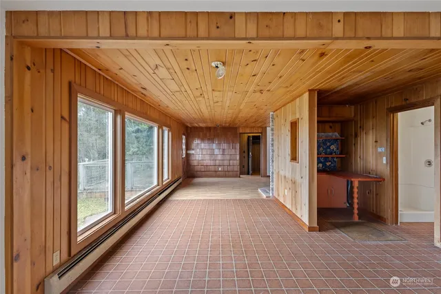a view of a room with a large window