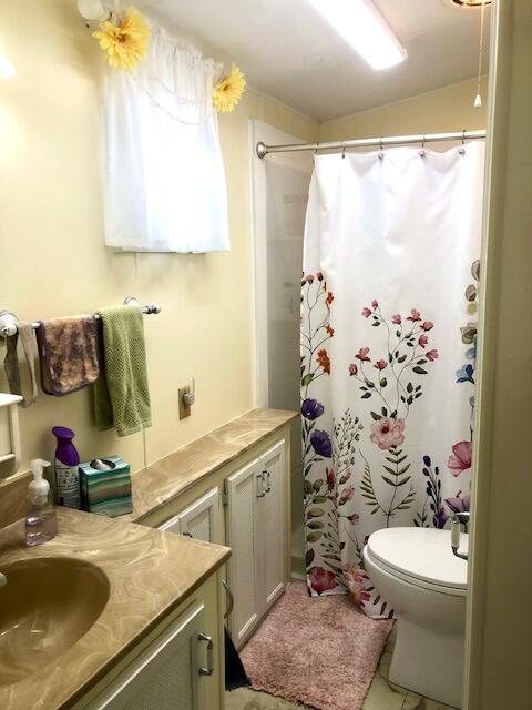 55 Boca Chica Road, Unit 132 Key West, FL 33040 - Photo 14 of 54 a bathroom with a sink toilet and shower