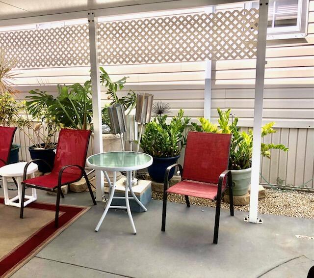 55 Boca Chica Road, Unit 132 Key West, FL 33040 - Photo 15 of 54 a building outdoor space with patio furniture