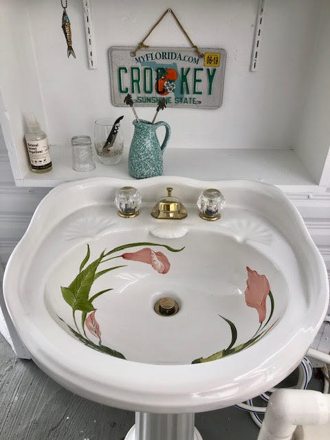 55 Boca Chica Road, Unit 132 Key West, FL 33040 - Photo 19 of 54 a bathroom with a sink and mirror