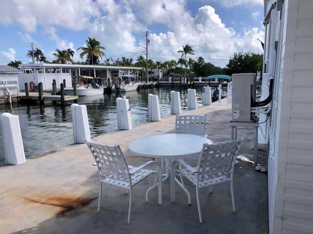 55 Boca Chica Road, Unit 132 Key West, FL 33040 - Photo 20 of 54 a view of a terrace with sitting area