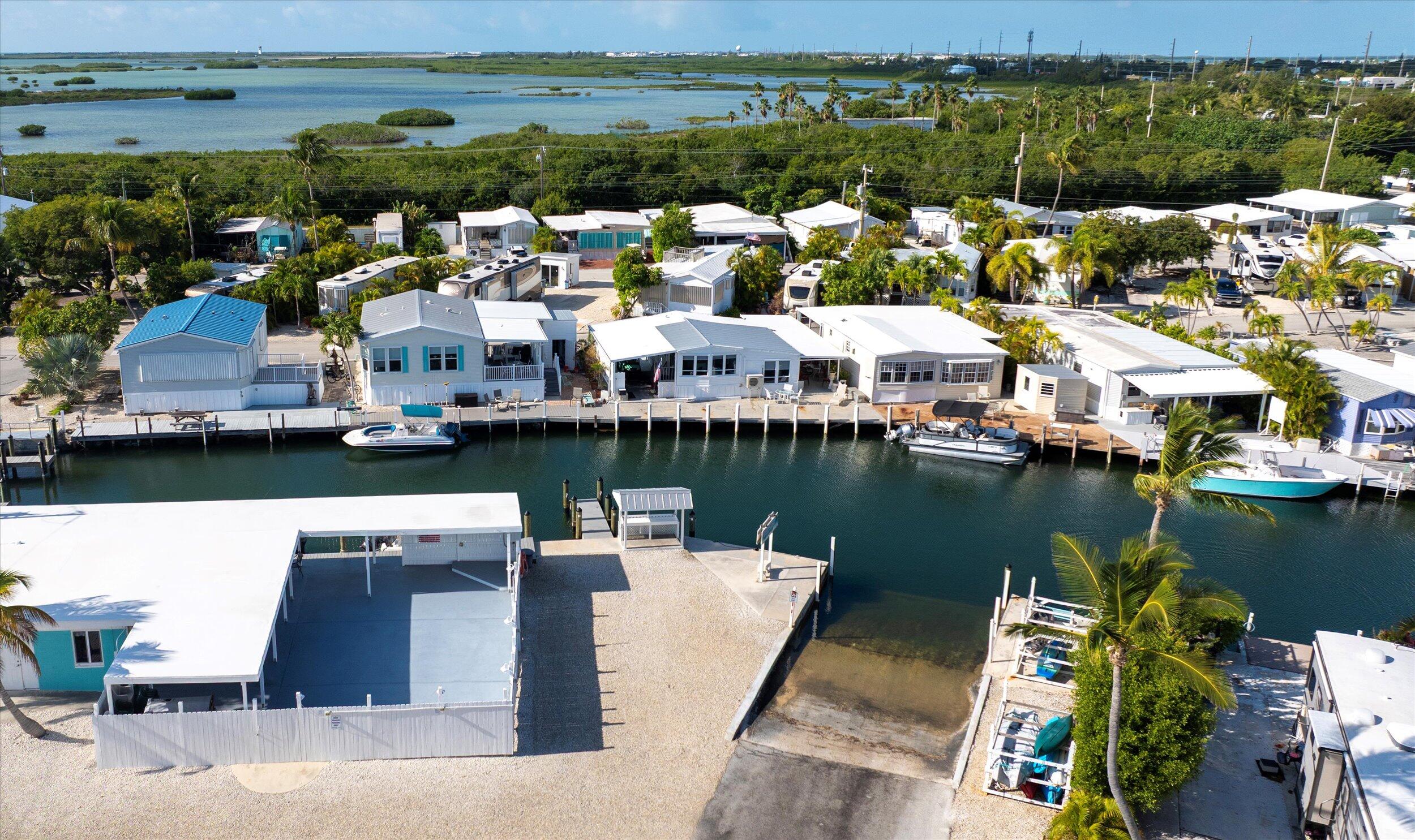 55 Boca Chica Road, Unit 132 Key West, FL 33040 - Photo 24 of 54 an aerial view of a house with a lake view