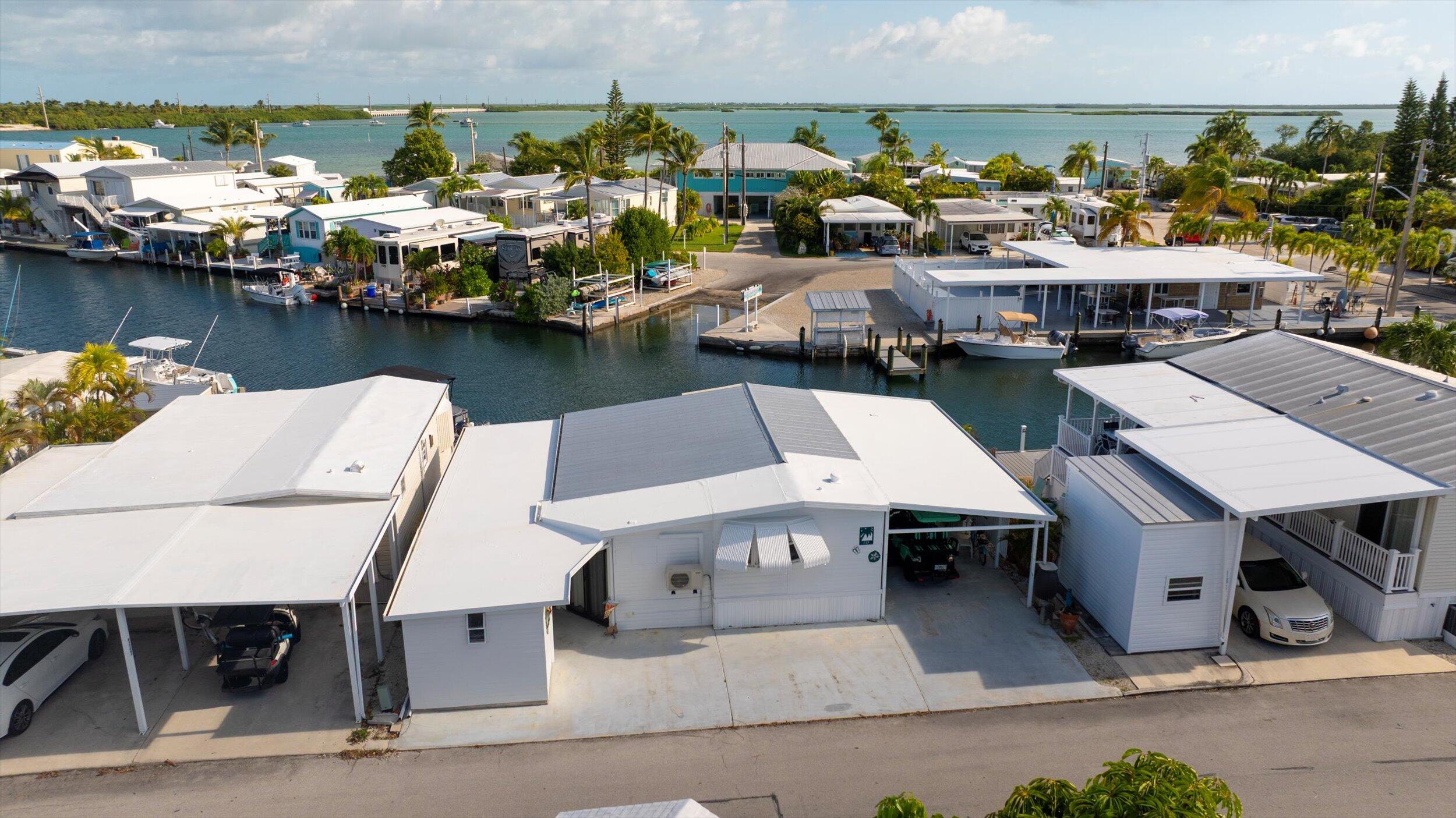 55 Boca Chica Road, Unit 132 Key West, FL 33040 - Photo 32 of 54 an aerial view of a house with boat