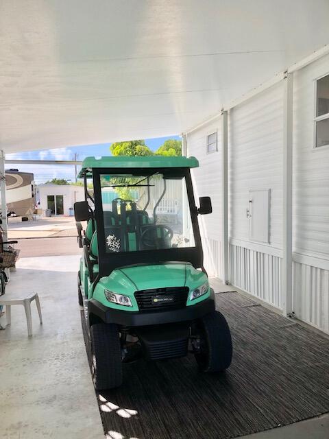 55 Boca Chica Road, Unit 132 Key West, FL 33040 - Photo 50 of 54 a room with wooden floor pool table and stairs