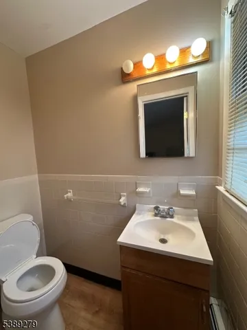 a bathroom with a sink and a toilet