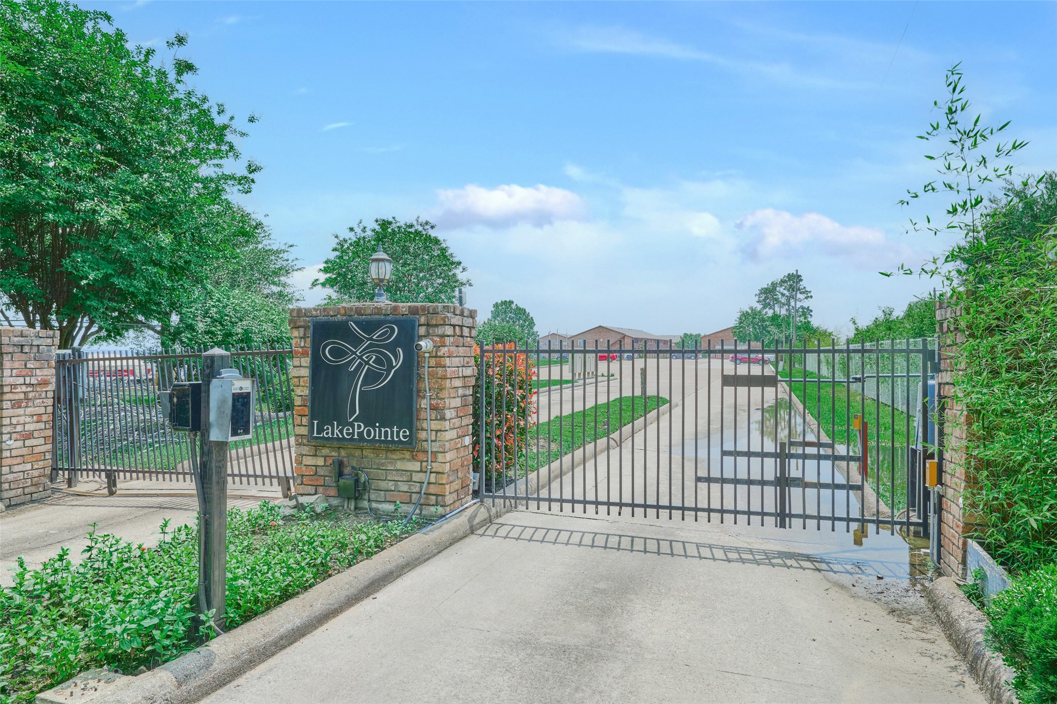 801 River Road, Unit 105D Montgomery, TX 77356 - Photo 30 of 32 a view of a wrought iron fences in front of house