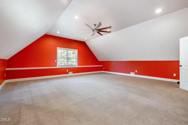 a room with pool and windows