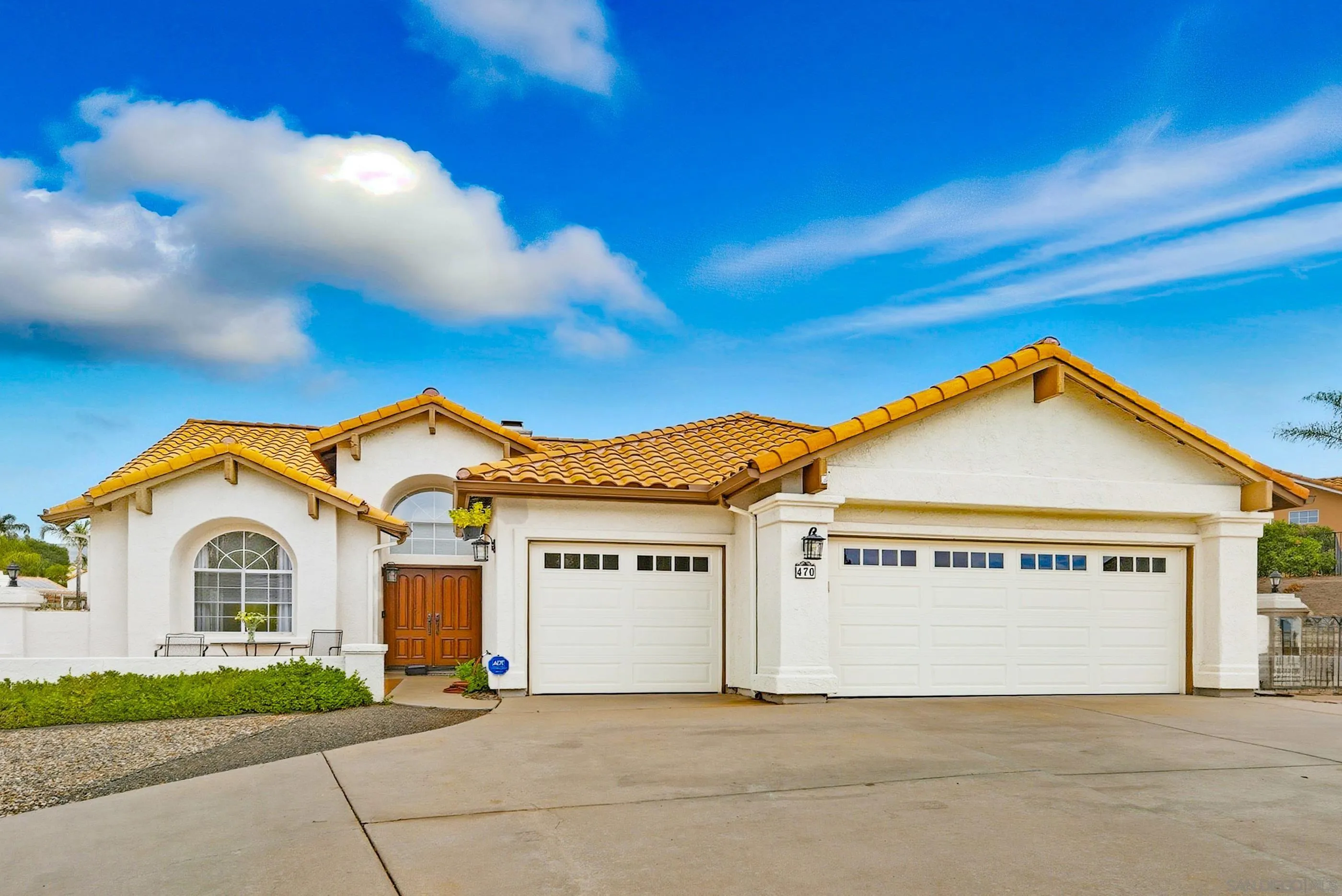 a view of front of house with a yard