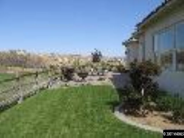 8375 Desert Candle Court Reno, NV 89523 - Photo 6 of 9 a view of a yard