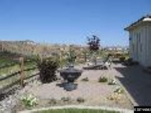 8375 Desert Candle Court Reno, NV 89523 - Photo 9 of 9 a view of a yard