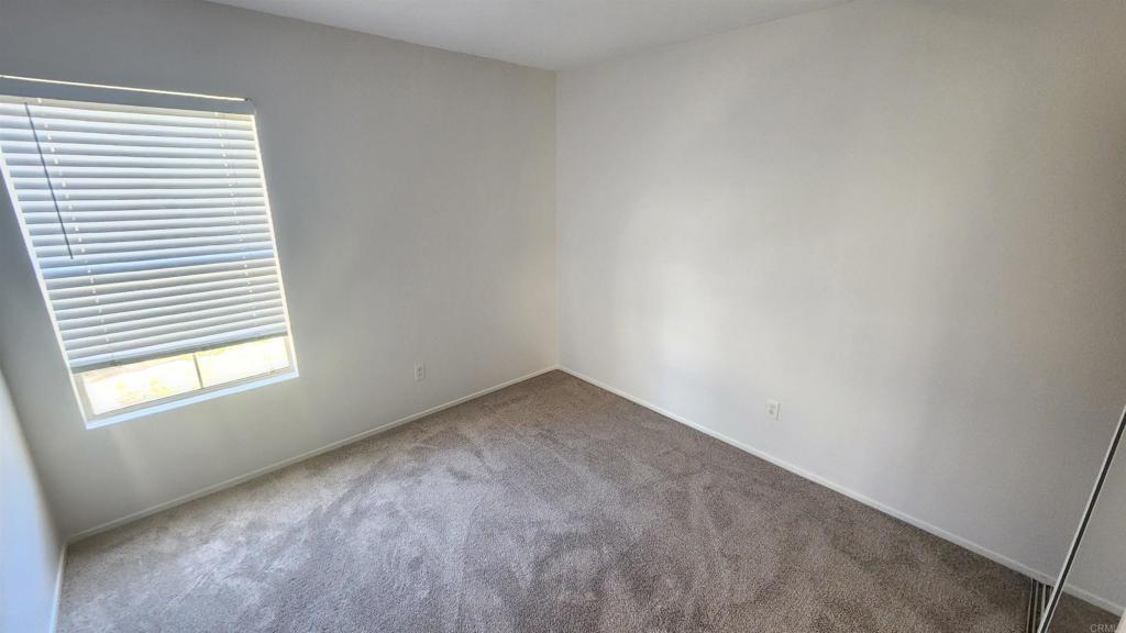 2023 Lakeridge Circle, Unit 203 Chula Vista, CA 91913 - Photo 13 of 24 an empty room with a window