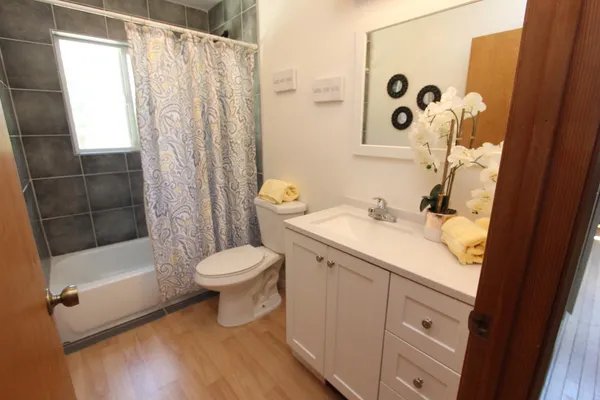 a view of a small space with wooden floor