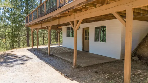 a picture of a room with a white wall and a picture