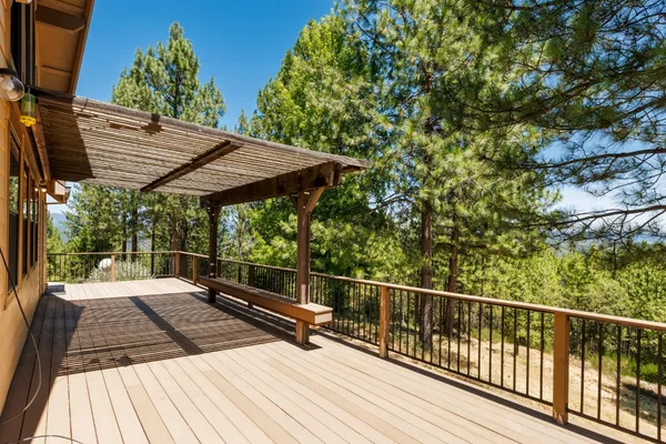a view of a house with a tree