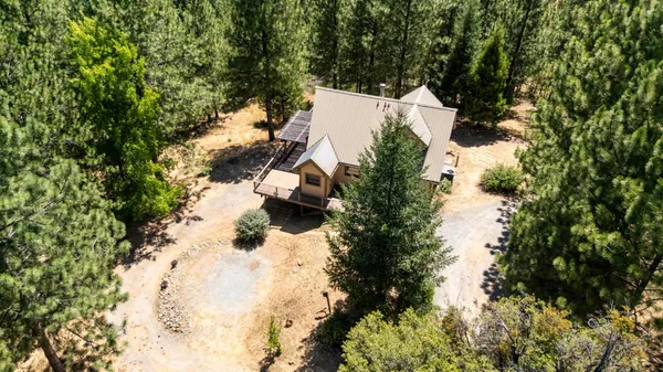 an aerial view of residential house with parking space