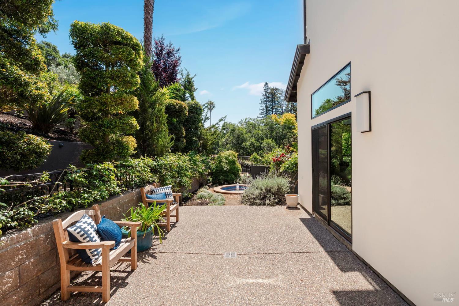 21 Newhall Drive San Rafael, CA 94901 - Photo 16 of 69 a view of a patio with table and chairs and potted plants