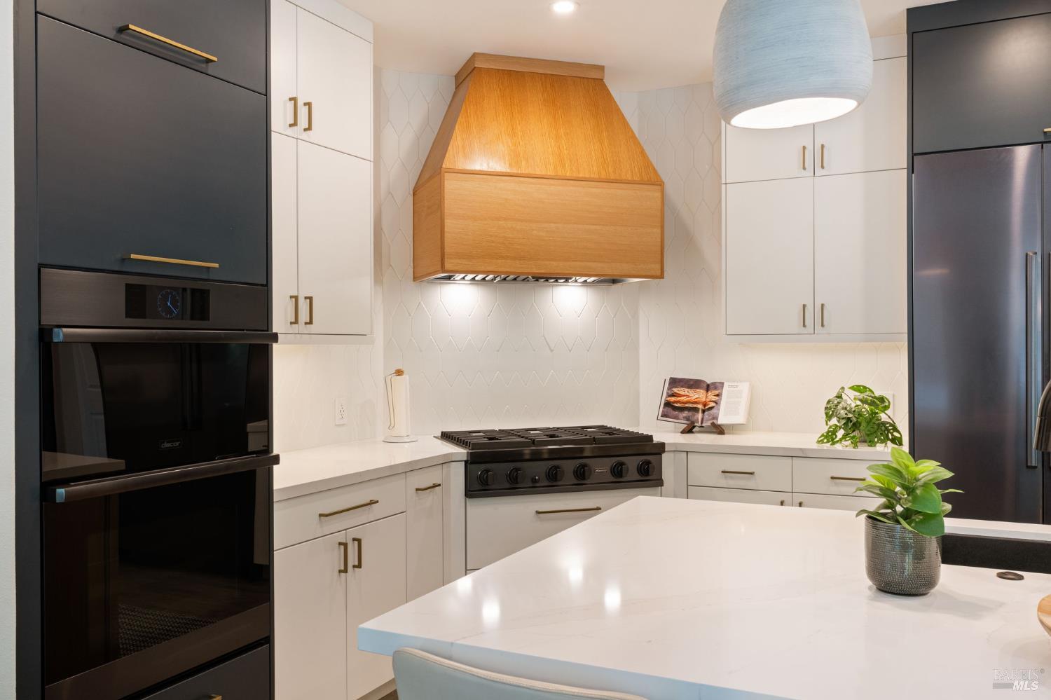 21 Newhall Drive San Rafael, CA 94901 - Photo 20 of 69 a kitchen with a refrigerator and a stove