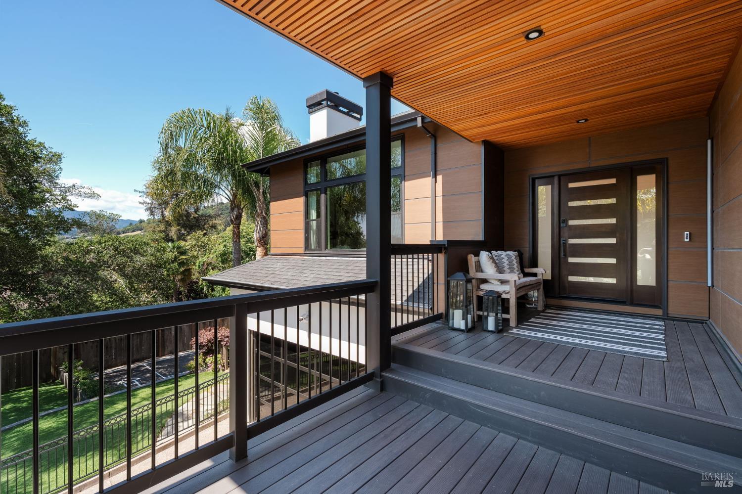 21 Newhall Drive San Rafael, CA 94901 - Photo 2 of 69 a view of a balcony with chairs and wooden floor