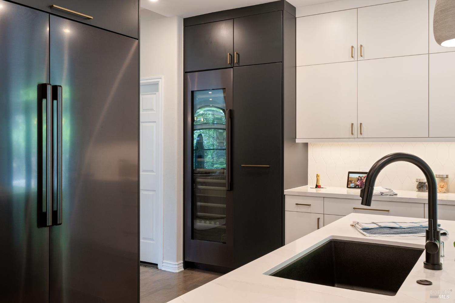 21 Newhall Drive San Rafael, CA 94901 - Photo 23 of 69 a kitchen with a refrigerator and a sink